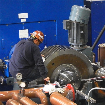 industrial gearbox repair specialist working